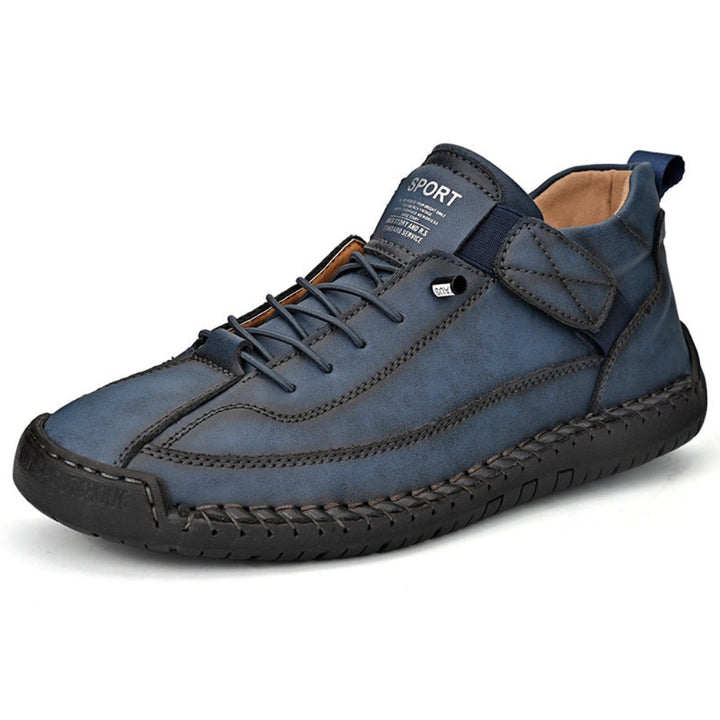 https://cdn.shopify.com/s/files/1/0620/0587/0655/files/men-s-leather-orthopedic-sneakers-black-with-comfo-1.jpg?v=1771633019