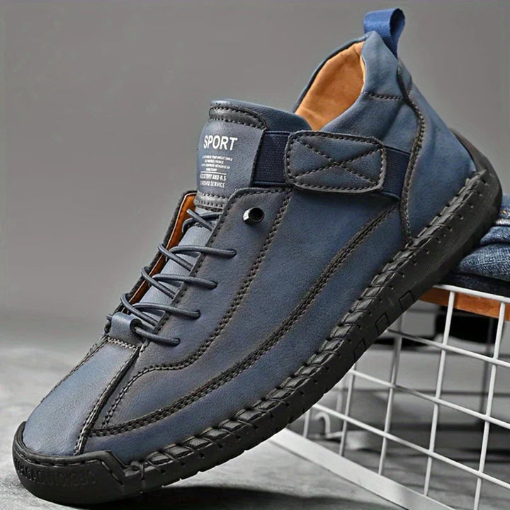 https://cdn.shopify.com/s/files/1/0620/0587/0655/files/men-s-leather-orthopedic-sneakers-black-with-comfo-3.webp?v=1771633024