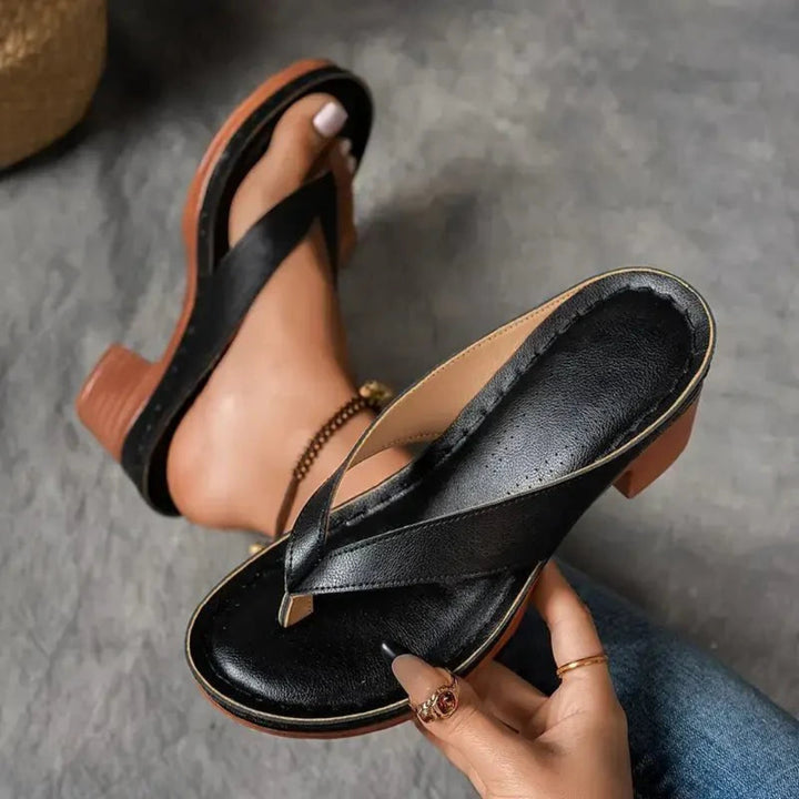 https://cdn.shopify.com/s/files/1/0620/0587/0655/files/womens-orthopedic-heel-sandals-black-3536981.webp?v=1755114088